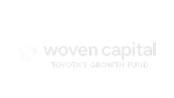 A light gray logo featuring the text "woven capital" with "Toyota's Growth Fund" written beneath it.